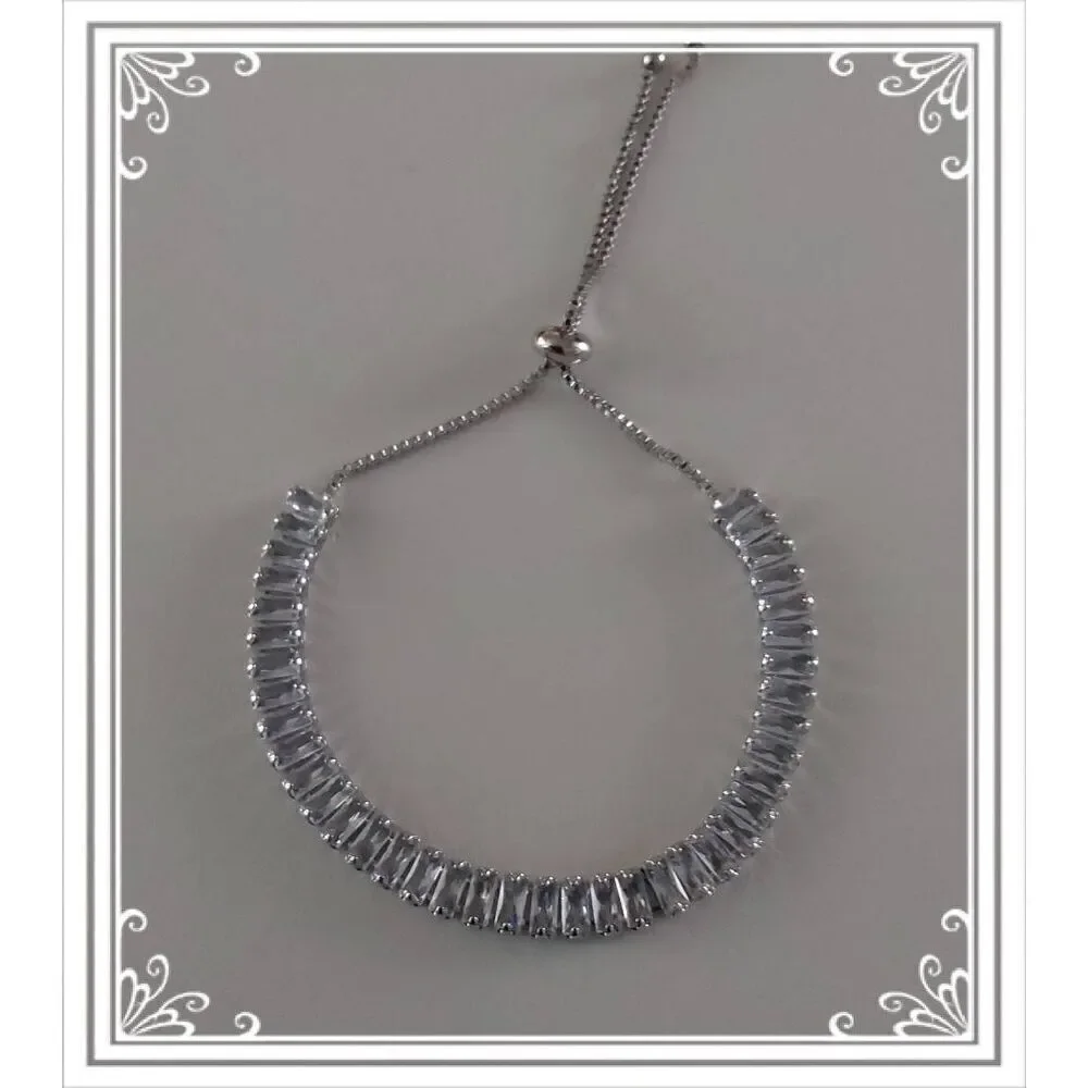 Gorgeous 10 Ct. Baguette Cut Sim Diamond Bolo Tennis Bracelet~18KWGP~New